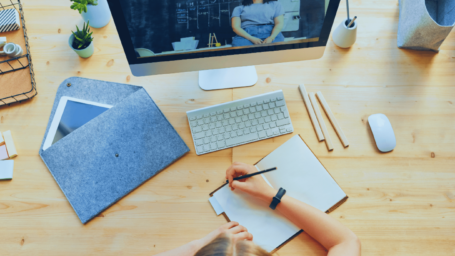 top-view-photo-of-person-writing-on-white-paper