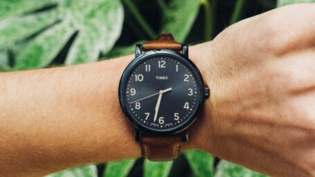 a photo of an arm with a wrist watch