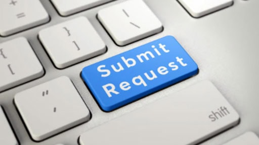 Computer keyboard, one key says Submit Request