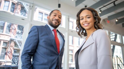 Man and Woman in Business Clothes